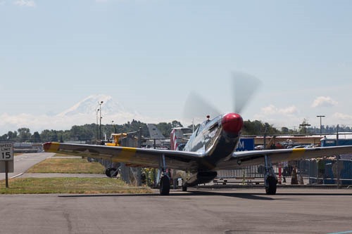 TP-51C Mustang warms up, with Mount Rainier in the background.